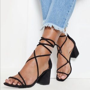 PLT black block heel sandal.